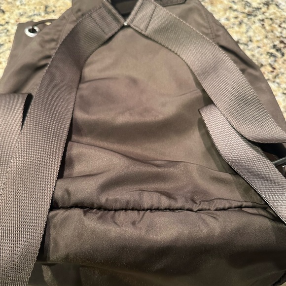 Prada backpack. Pre loved. Brown in color. Pockets inside and outside. - Picture 8 of 12
